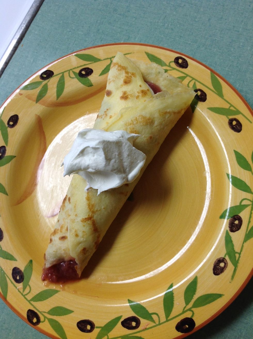 Roll your strawberry sauce up into crepe and enjoy!