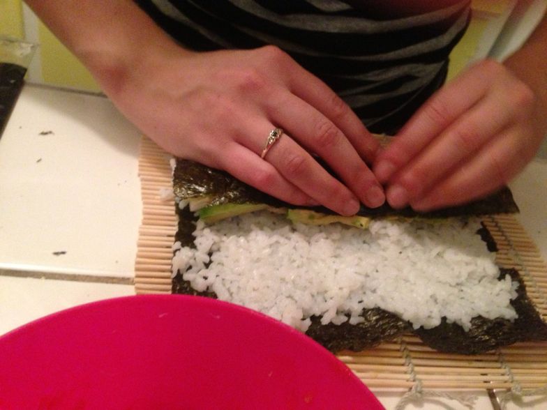 https://guides.brit.co/media-library/rollllin-rollllin-rollin-up-the-sushi-don-t-touch-the-bamboo-yet-try-to-wrap-the-seaweed-around-all-of-your-stuffing-then-ke.jpg?id=24336441&width=784&quality=85