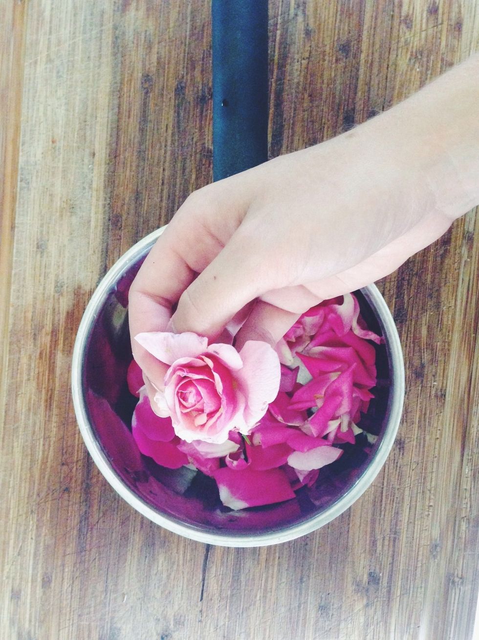 Rose water is best made using fresh roses - grocery store/floral shop roses are typically a few days old when they hit the store, and won't be as fragrant as possible.