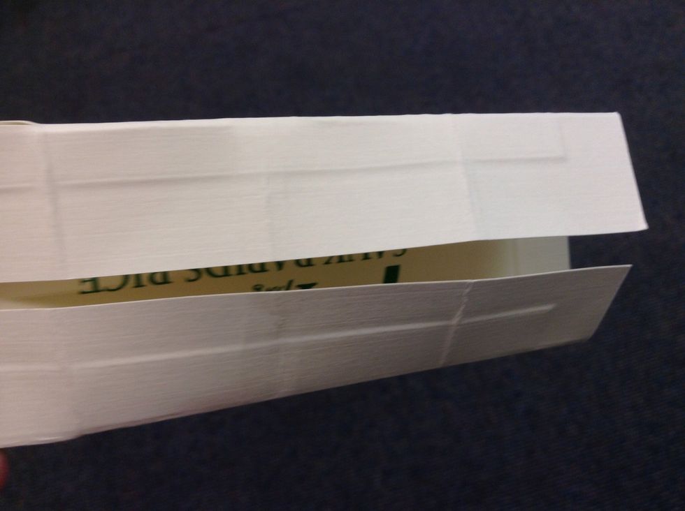 Rotate 90\u00b0 and Bend in 1/2, but only squeeze edge to mark midpoint.