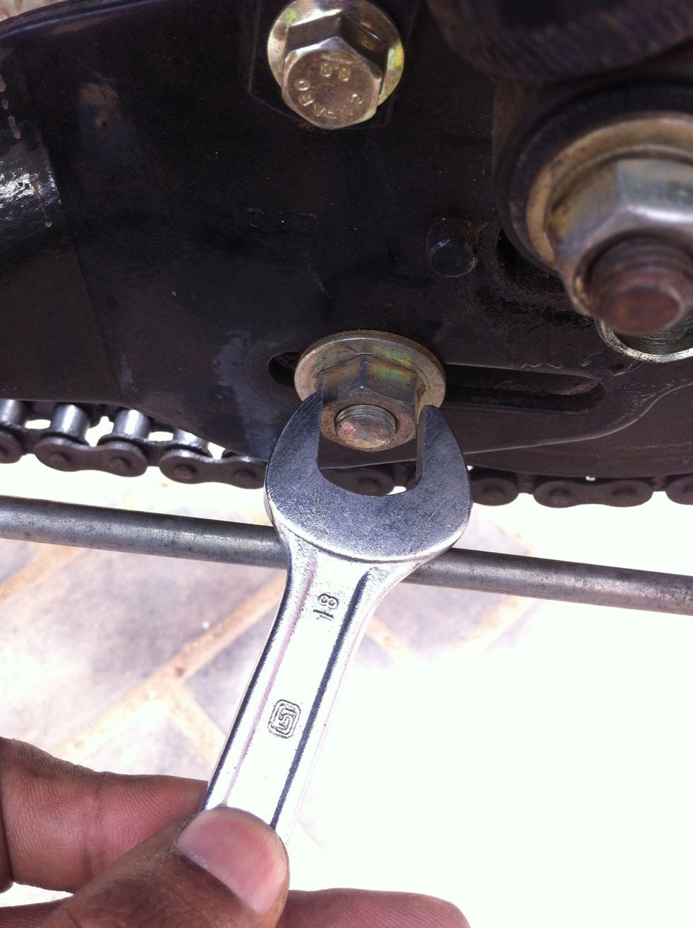 Rotate anti clock wise to remove this 18mm nut