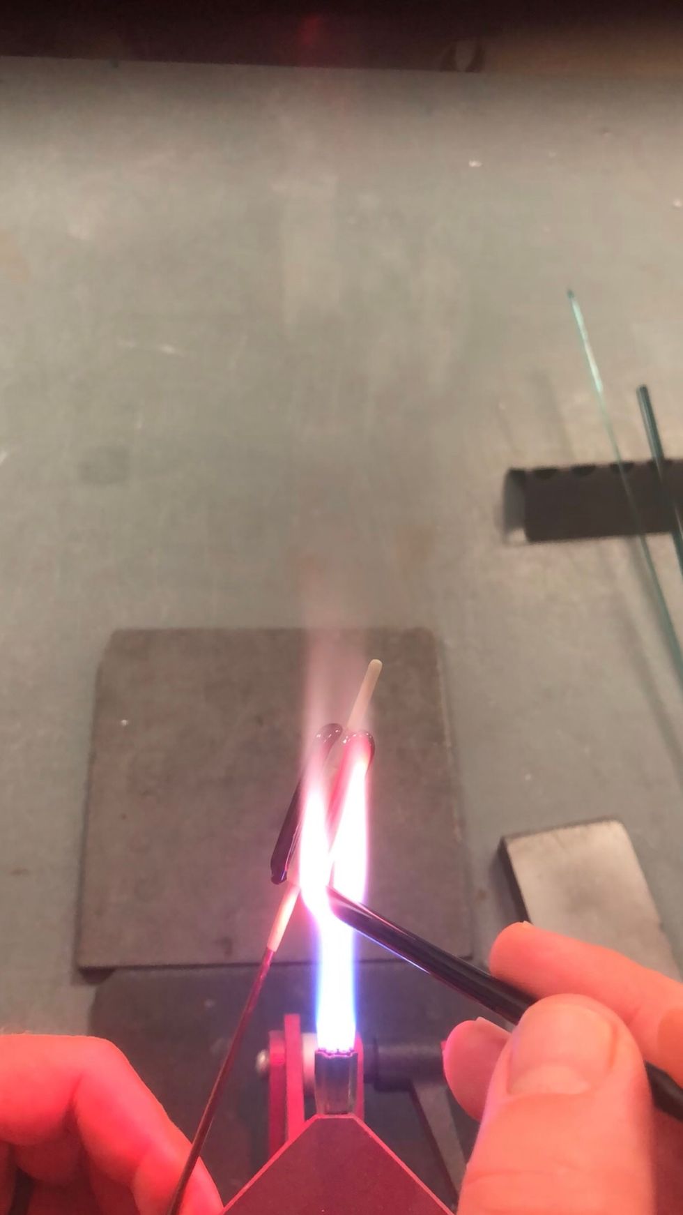 Rotate the bead 180 degrees and apply another stripe opposite the first.