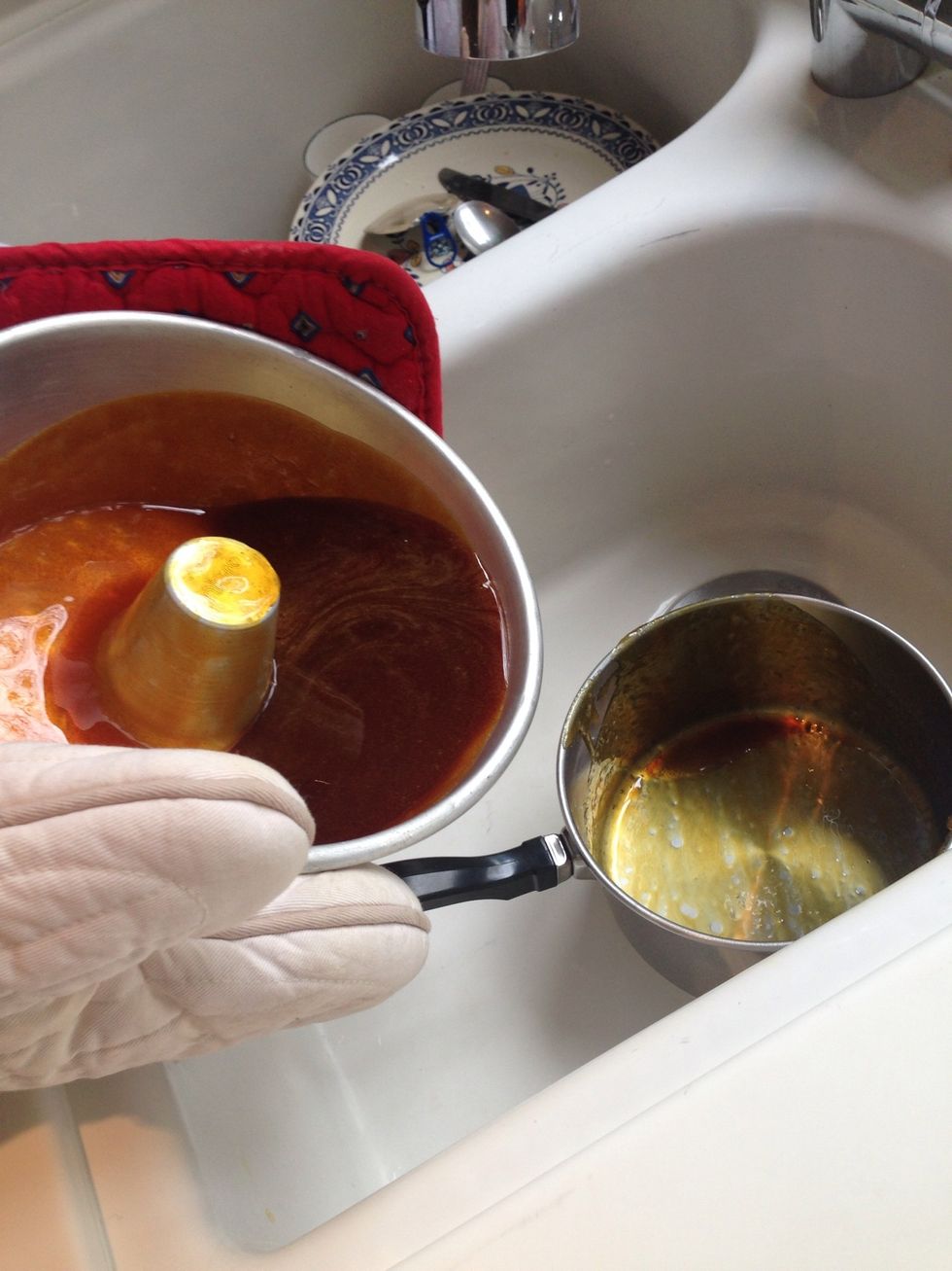 Rotate the bundt form pan carefully to give the side of the pan a thin layer as well.