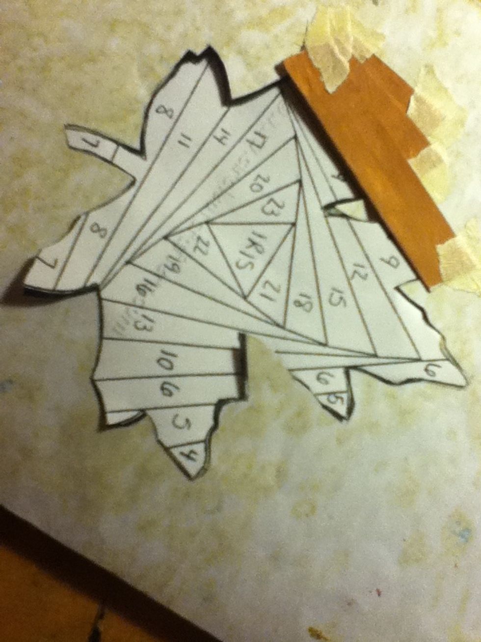 Rotate the card so that the number four is closest to you