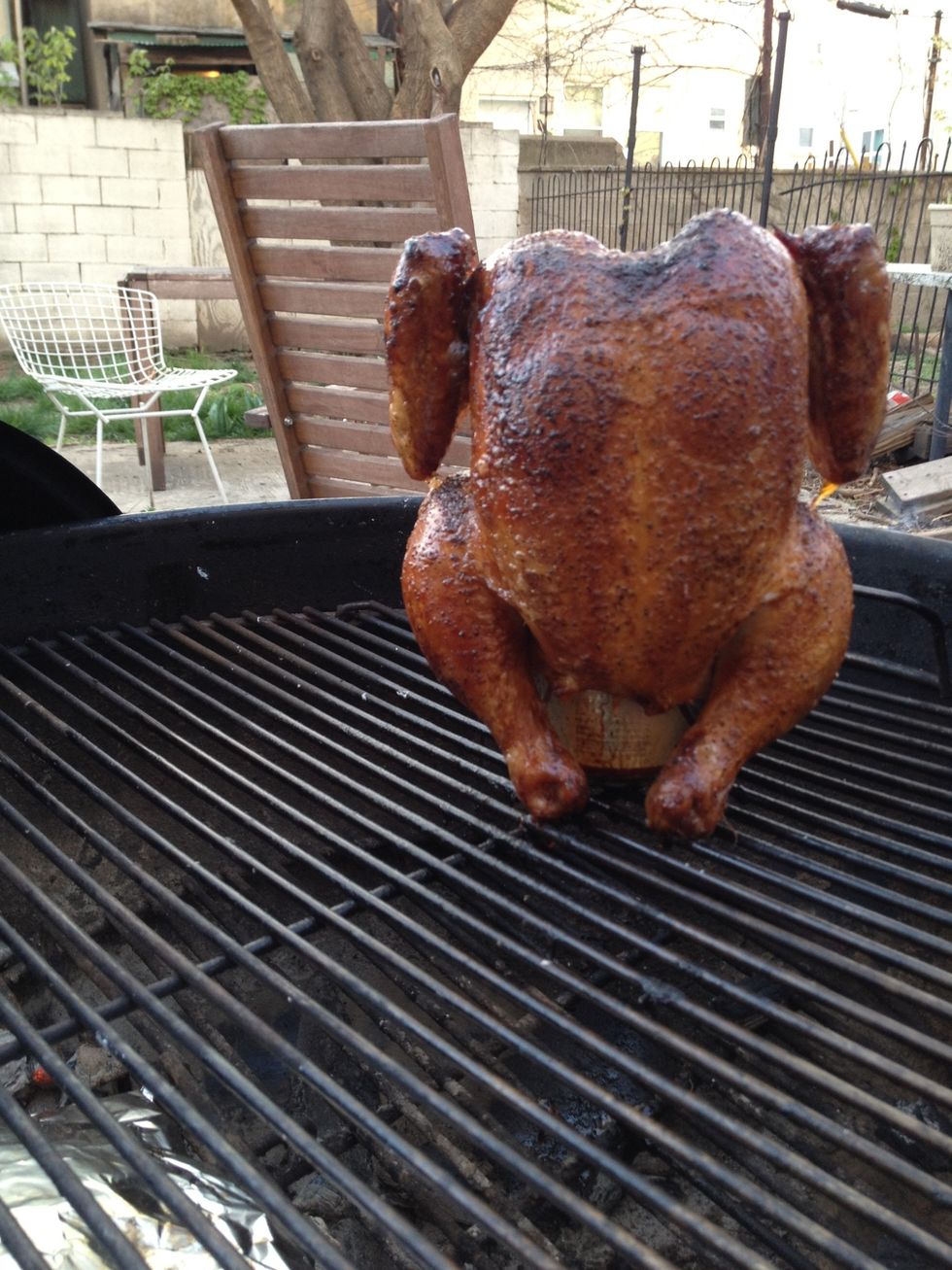 rotate the chicken after half an hour and continue to cook. At least another half hour, maybe 45 minutes. We're looking for the breast meat to be around 160\u00b0F, and the juices to run clear.