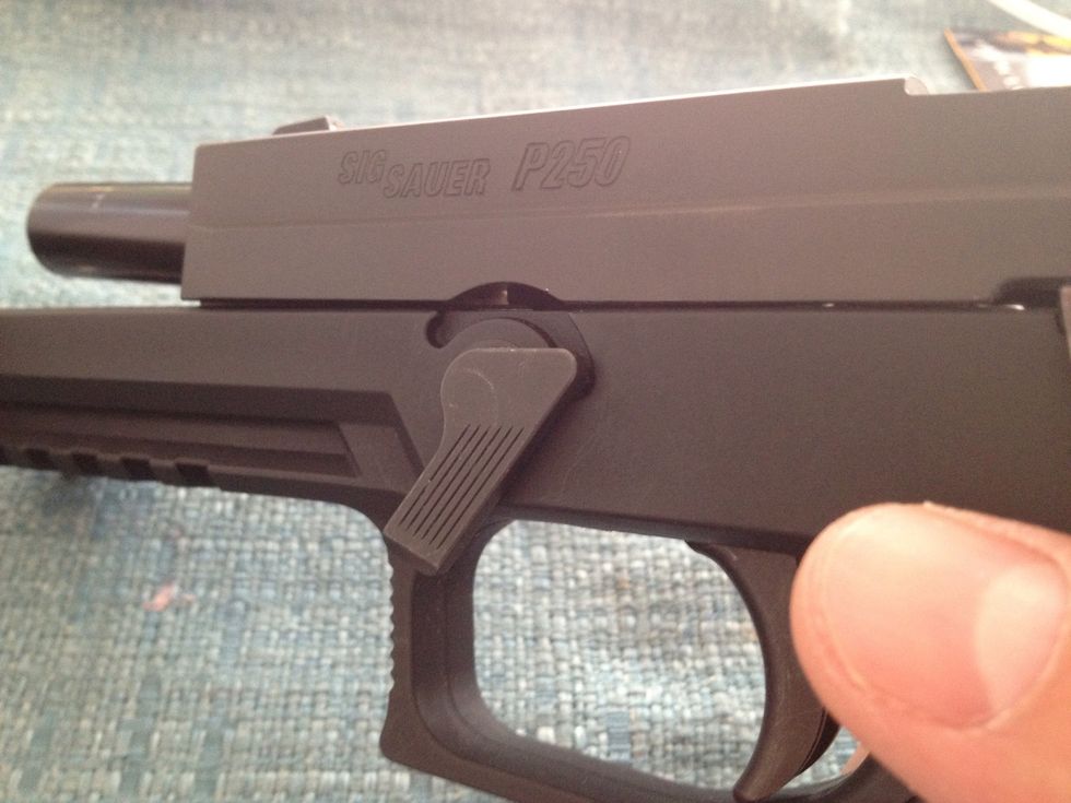 Rotate the takedown lever clockwise until takedown lever can no longer rotate.