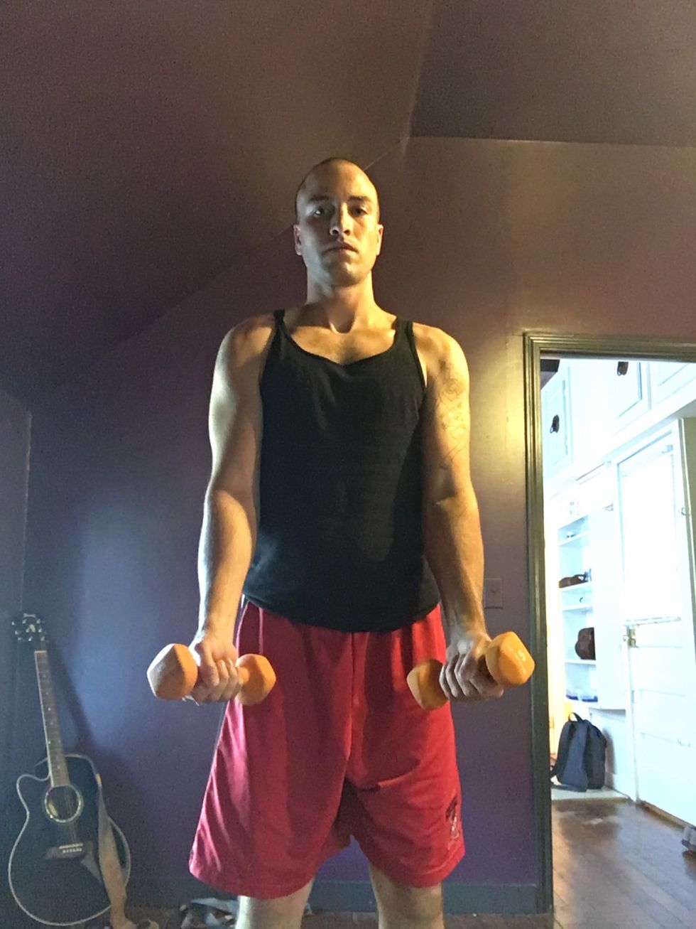 Rotate the weights outwards. As if you were holding a can of soda that you do not want to spill. You may feel less stabilized so keep the weight low.