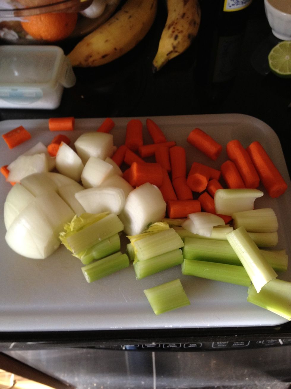 Rough chop onion, carrots, and celery.