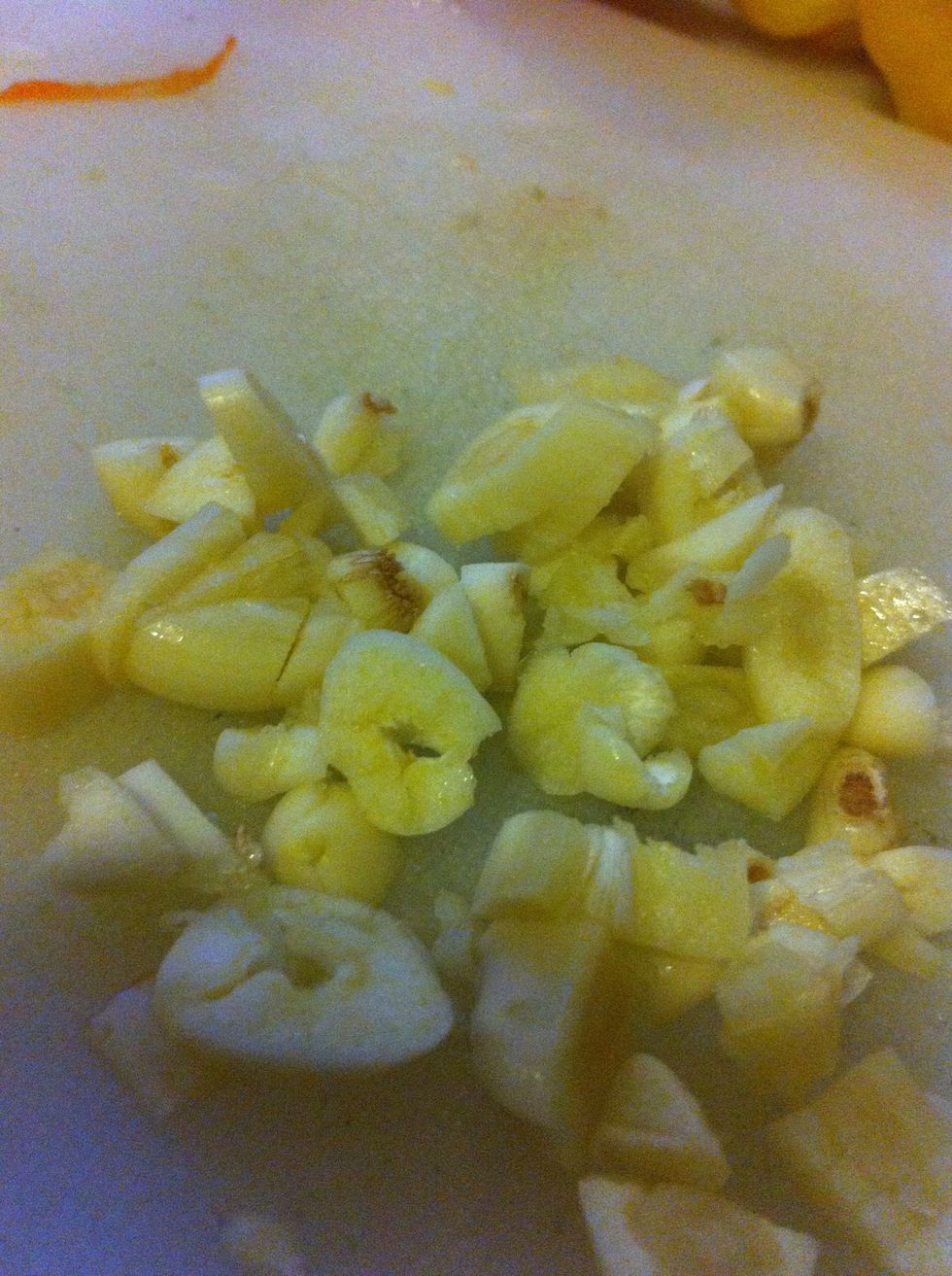 Roughly chop garlic...