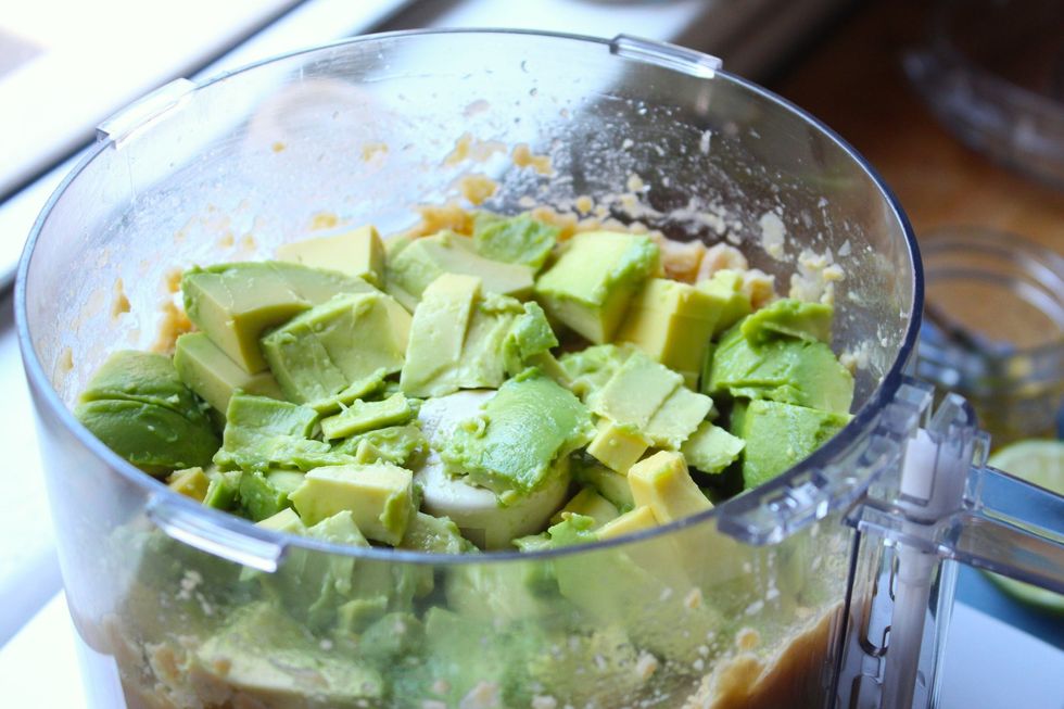 Roughly chop the avocados and add them to the food processor. Process these until well mixed and smooth - keep scraping down the sides!