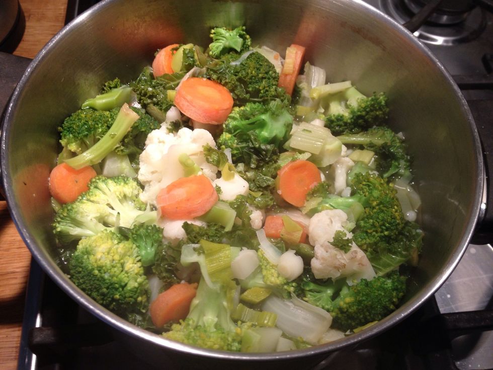 Roughly chop your choice of veg This is cauliflower, broccoli, leeks, celery, kale and carrots. Boil until soft, around 10 mins. Add the broccoli after the rest as it will take less time to cook.