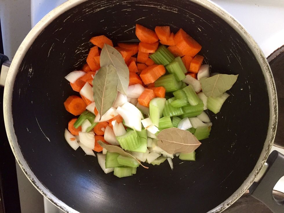 Roughly chop your vegs and add them to some vegetable oil with the bay leaves