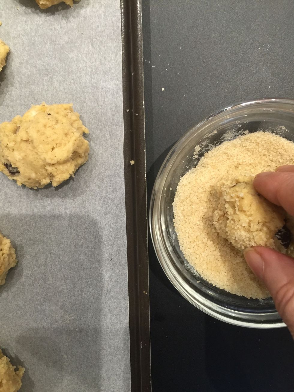 Roughly spoon them or just distribute the dough by hands... Children will have fun doing that. Then dip them in brown sugar for more crunchy bites