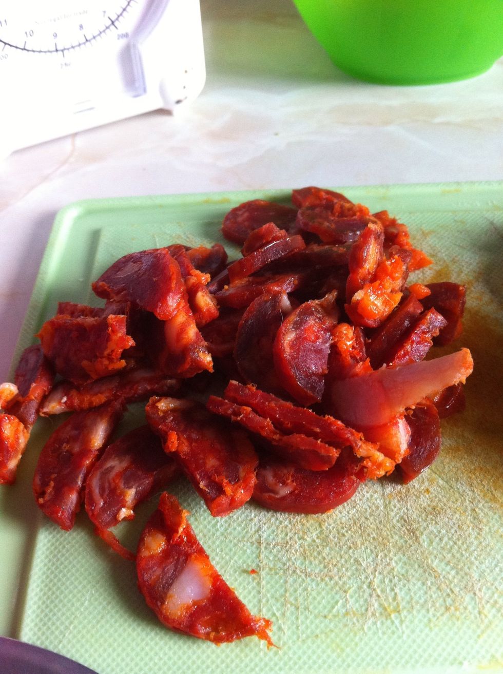 Roughly this much chorizo nicely sliced. Its really up to you how much or if you add/replace it with chicken.