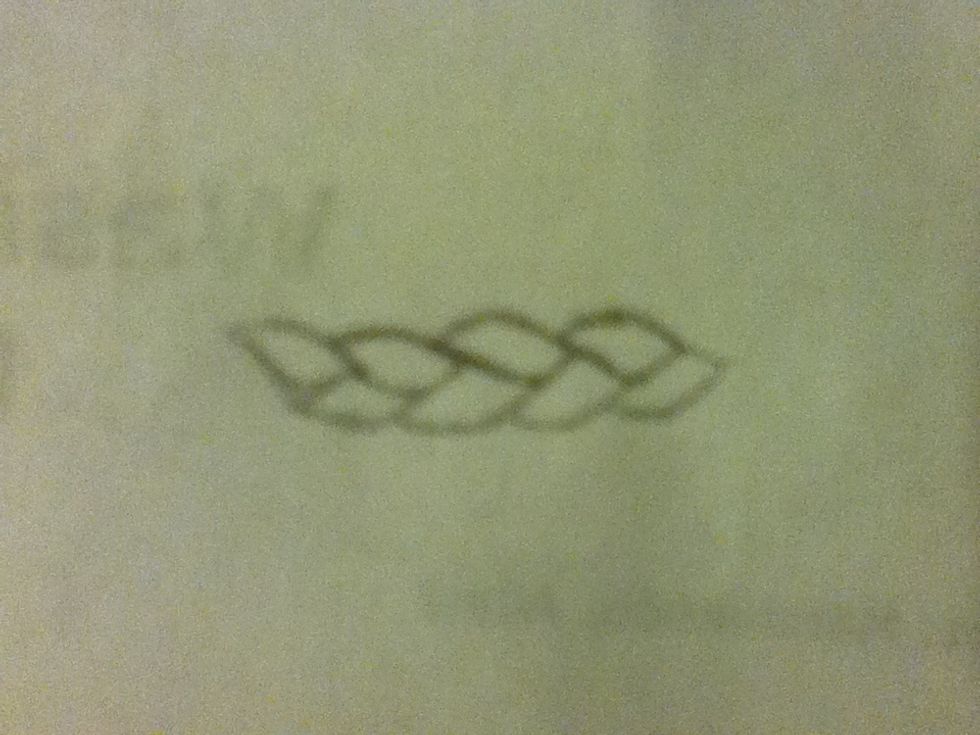 Round out your lines to create leaf like shapes Sorry about the blurry picture