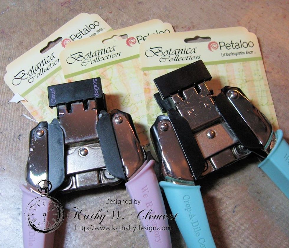 Round the corners on the bottom edge of each tag. Use the Scalloped Edge of a Crop A Dile to shape the top corners as seen in the photo.