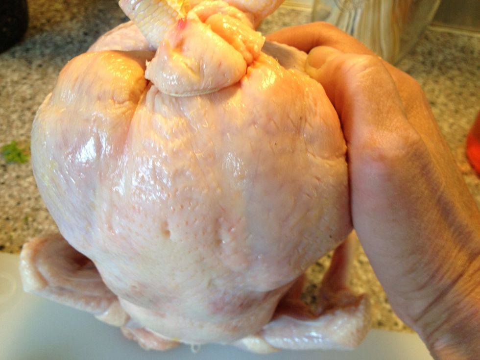 Round the parson's nose, this way the rump will act as a flap door over the cavity in your chicken.