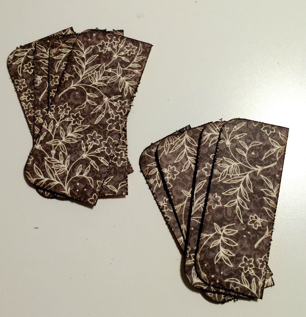 Round the top left & bottom right corners on all 8 pieces of cut floral paper. After the corners are rounded, edge distress the edges. Take a blending tool & Walnut Stain Distress Ink, ink the edges.