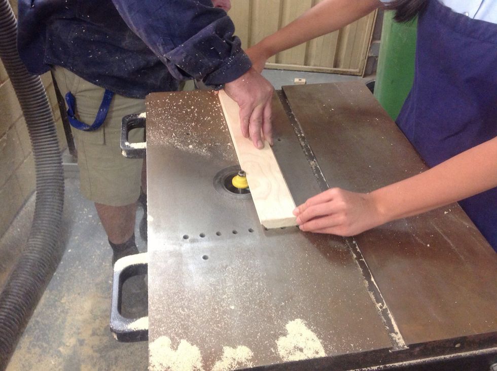 Rout the edge of the wood giving it a nice finish