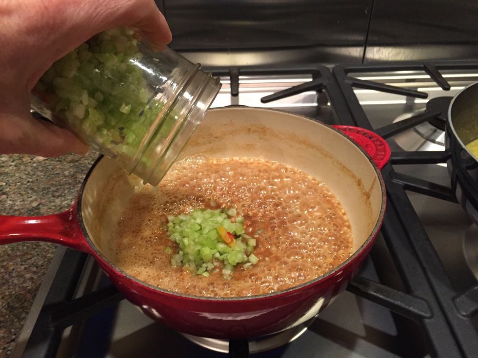 Roux and cooked onion having bell pepper/celery mixture added