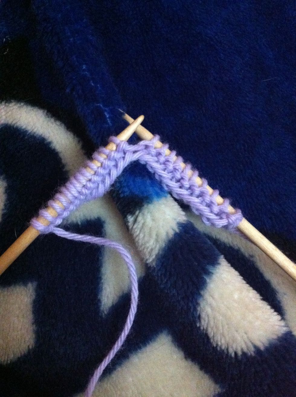 Row 2: knit until st before decrease. For my square I knit 10 sts.