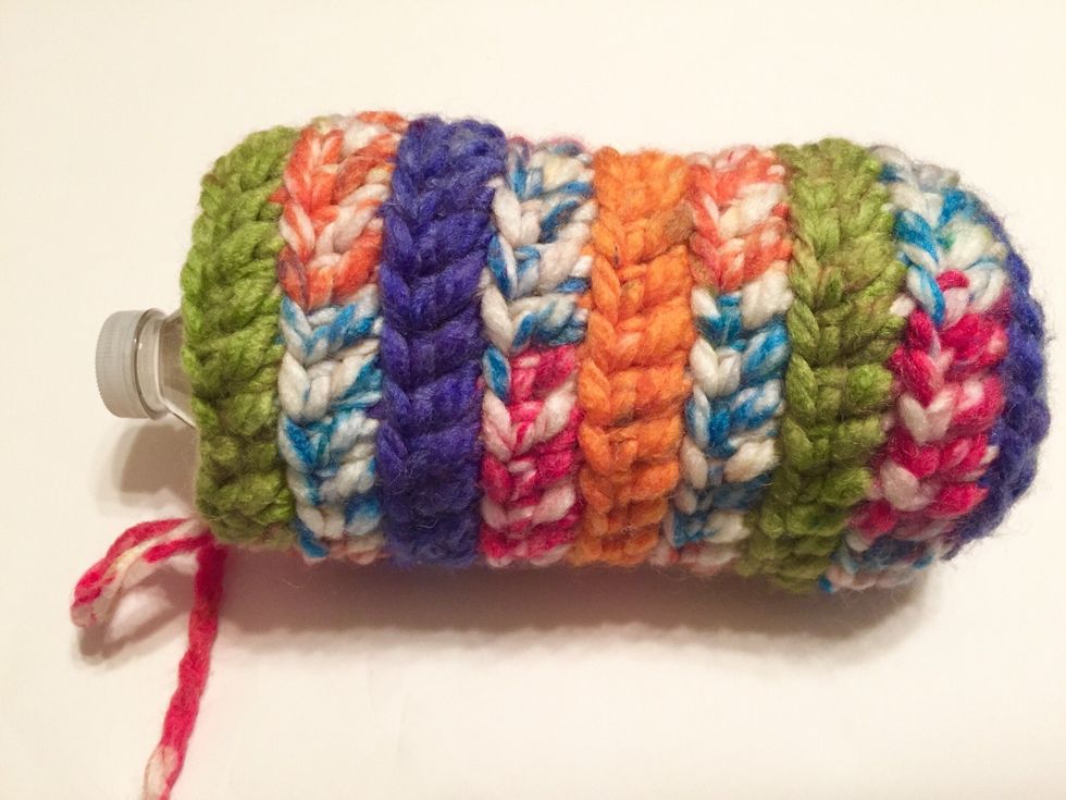 row 4 thru ?: chain 3, then double in top of each stitch all around. slip stitch to connect. repeat, adding rows until bottle holder is as tall as you would like. (my bottle holder had 10 rows total).
