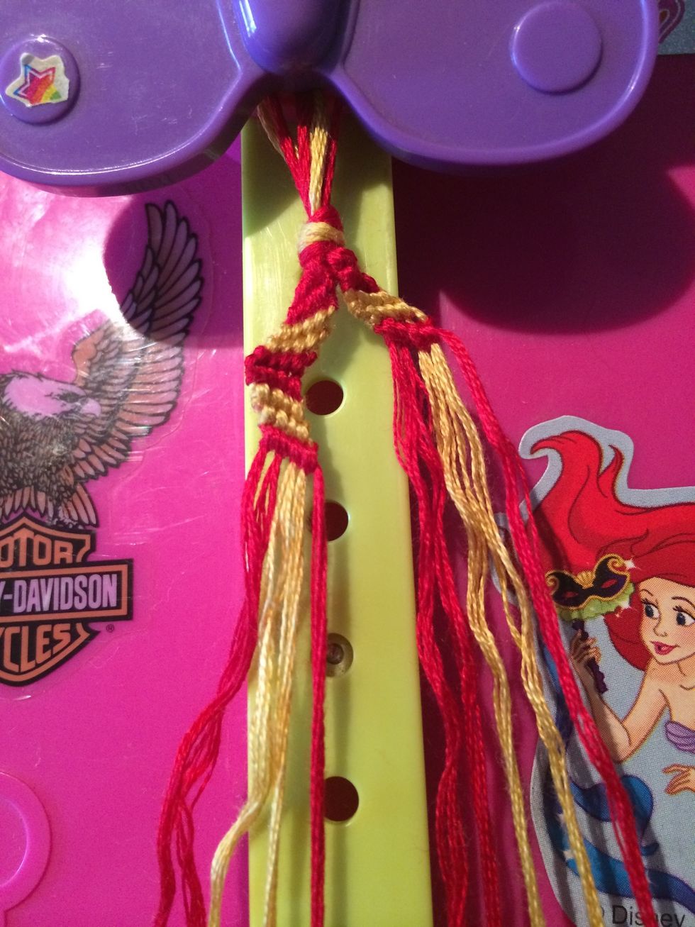 Row four is done. Let's knock row 5 put too. Grab the last red string and make your way across.