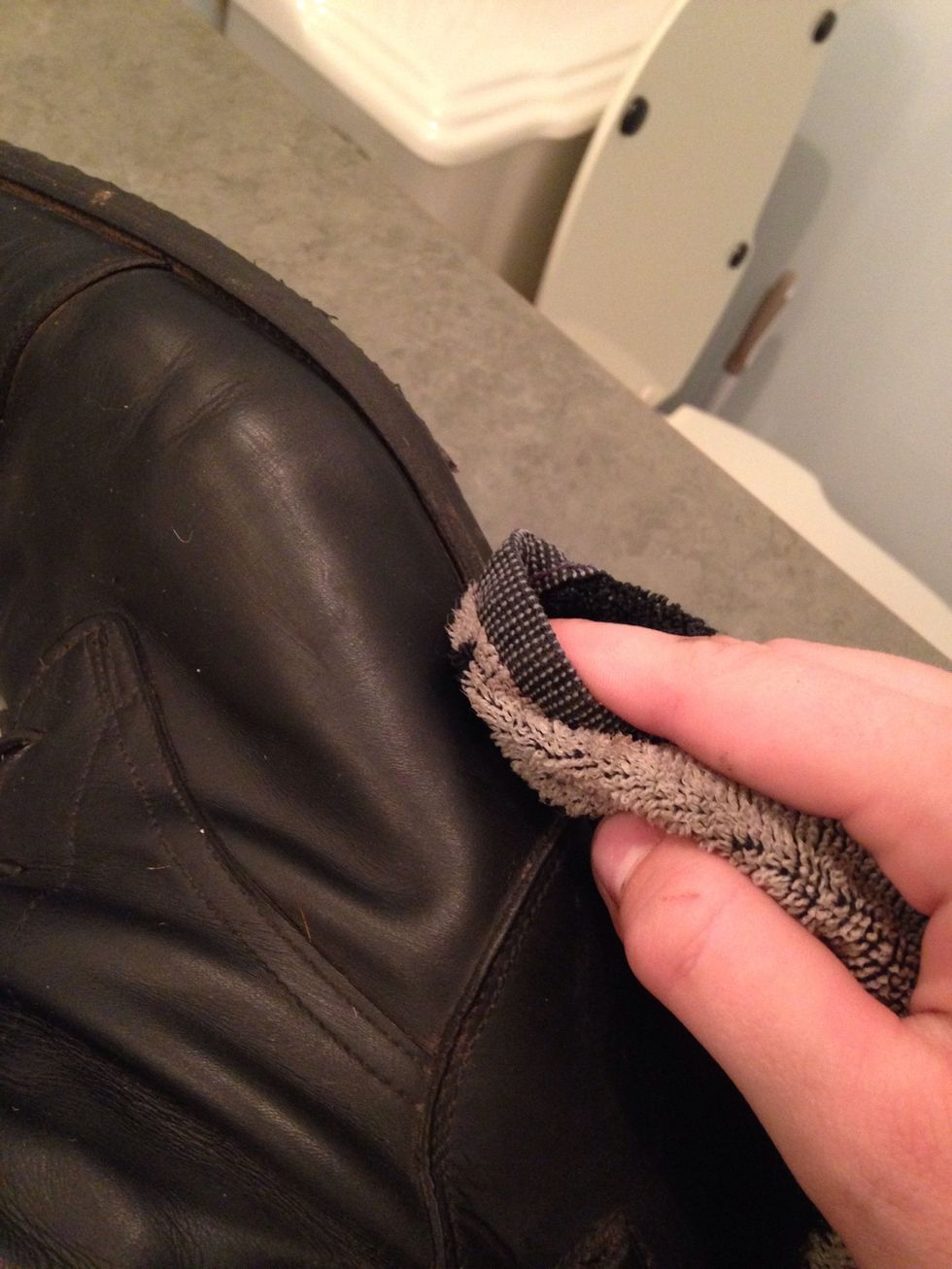 Rub down the entire boot with the damp cloth, being sure to get in the cracks.
