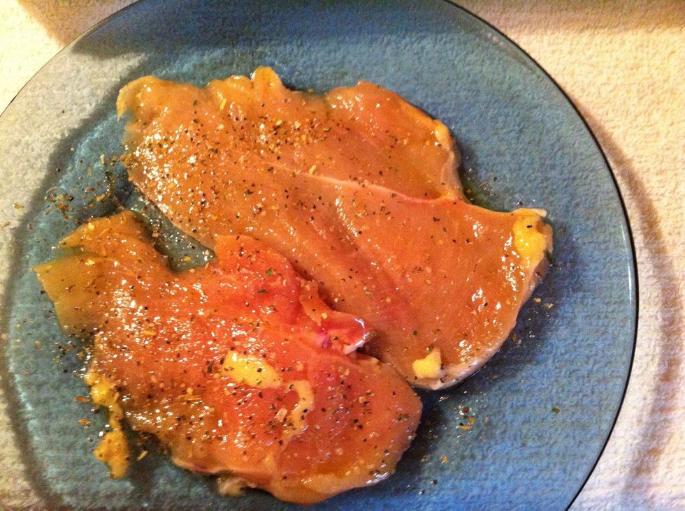 Rub each side of chicken with olive oil & then sprinkle each side with both seasonings.