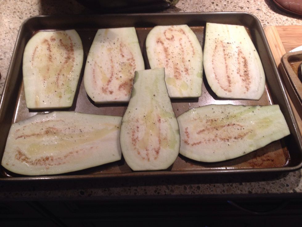 Rub it with olive oil, salt, and pepper.