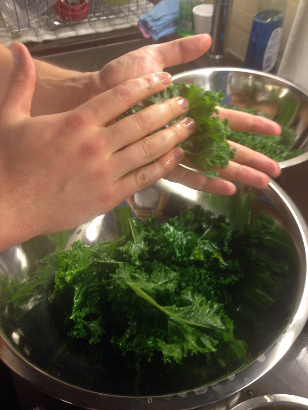 Rub kale with some olive oil and pinch of salt. It helps take away the bitterness.