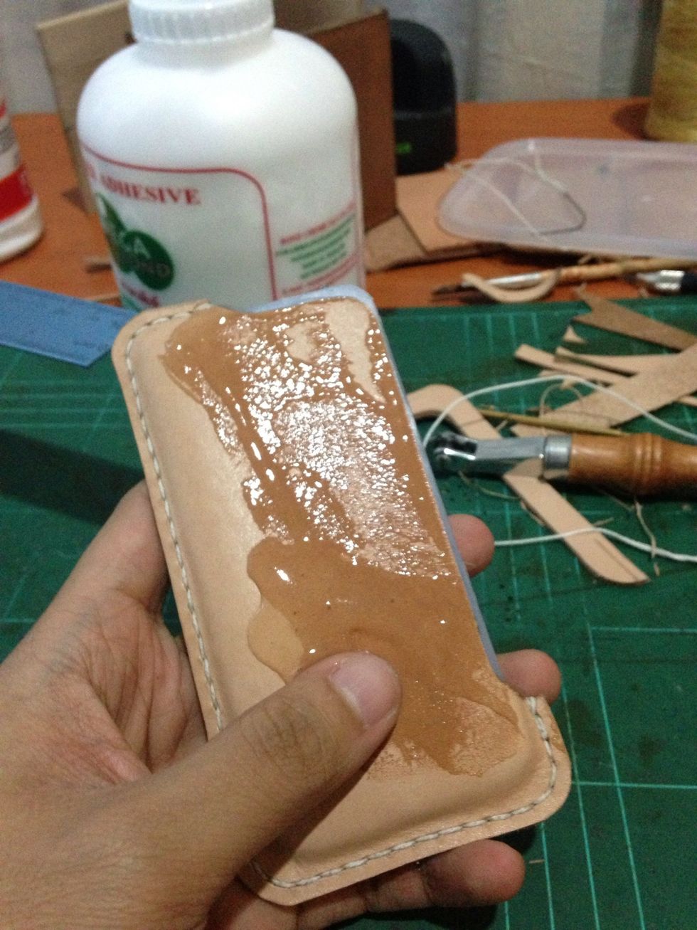 Rub more of gum tragacanth on the outside part and start massaging the case.. Yes do it gently until it form the iphone.. Do not used tool to form the leather or it will be scratch