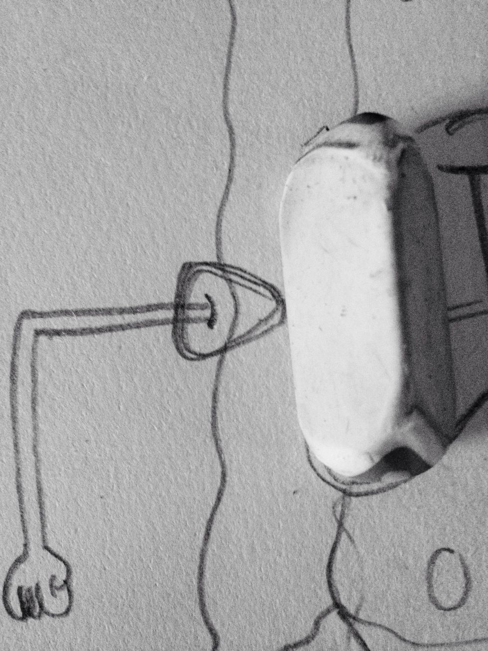 Rub out the lines that aren't needed, like this one next to the eraser.