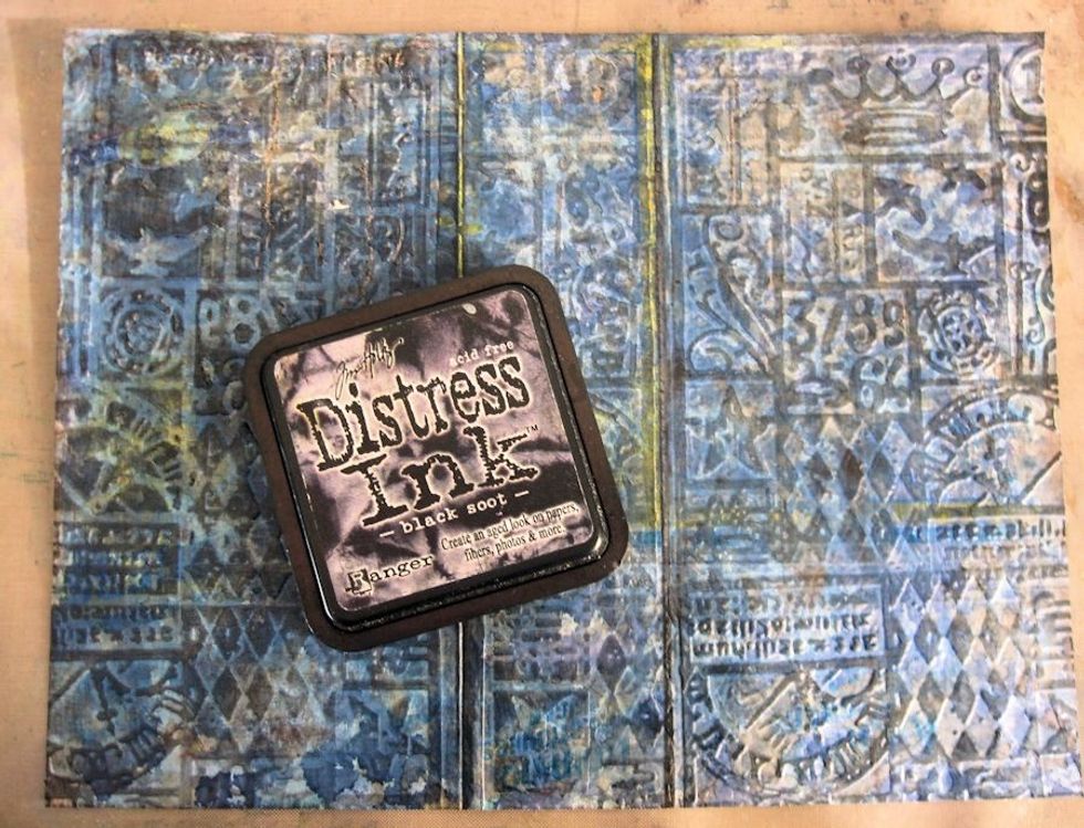 Rub the entire surface with Black Soot Distress Ink, being sure to take it all the way to the edge and into any crevices.  I applied the ink pad directly to the surface instead of using an applicator.