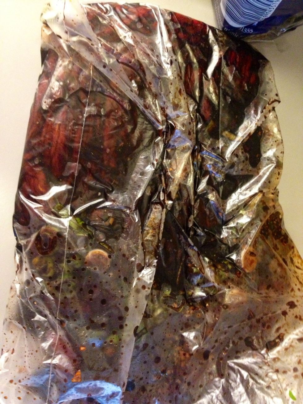 Rub the marinade and the veggies into the meat. Tie a knot and shake the bag so the lovely marinade covers all of the meat. Marinate at least 1 hour.