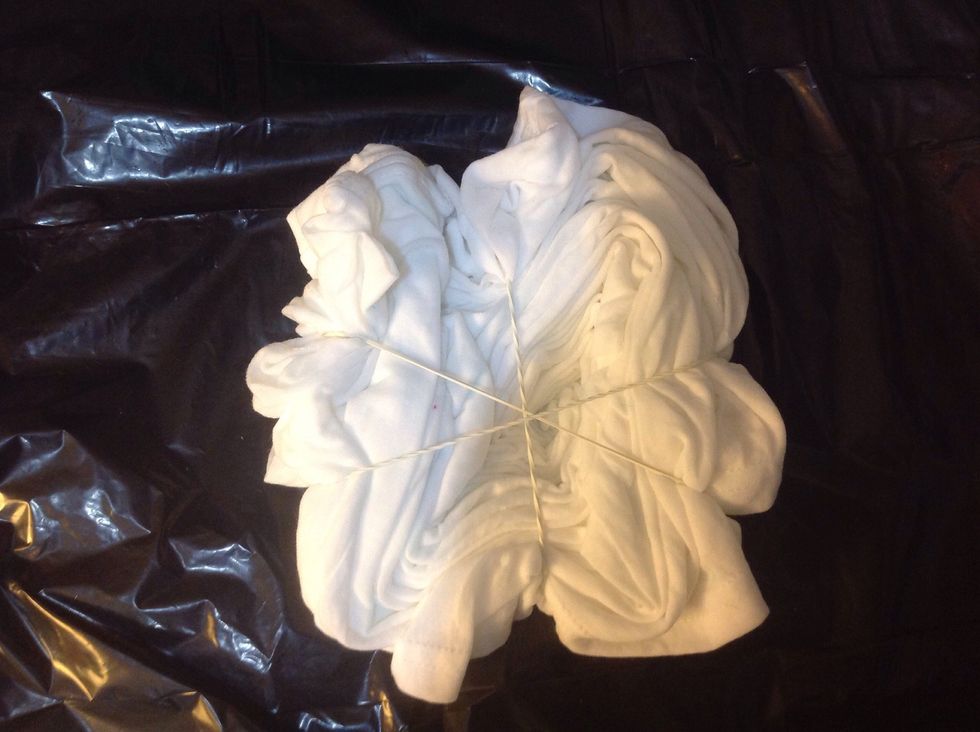 Rubber band the t-shirt like cuting pizza slices. I used three bands to form six wedges.