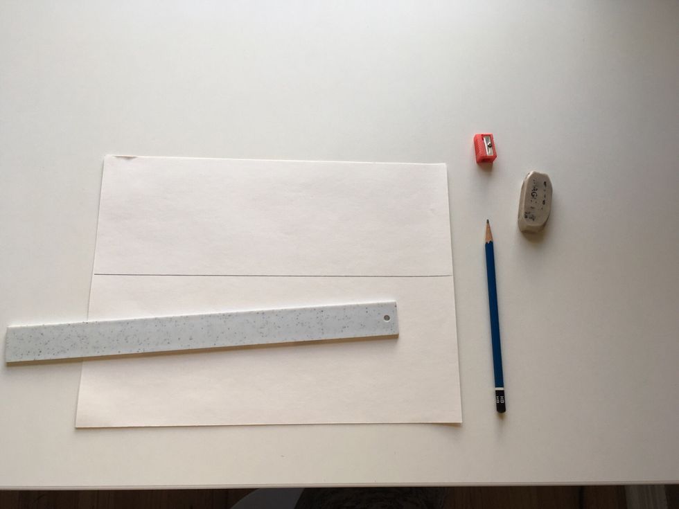 Ruler, sharp pencil and good eraser. Make a horizon line in the middle of your horizontal paper.  Watch to make sure it is not crooked.