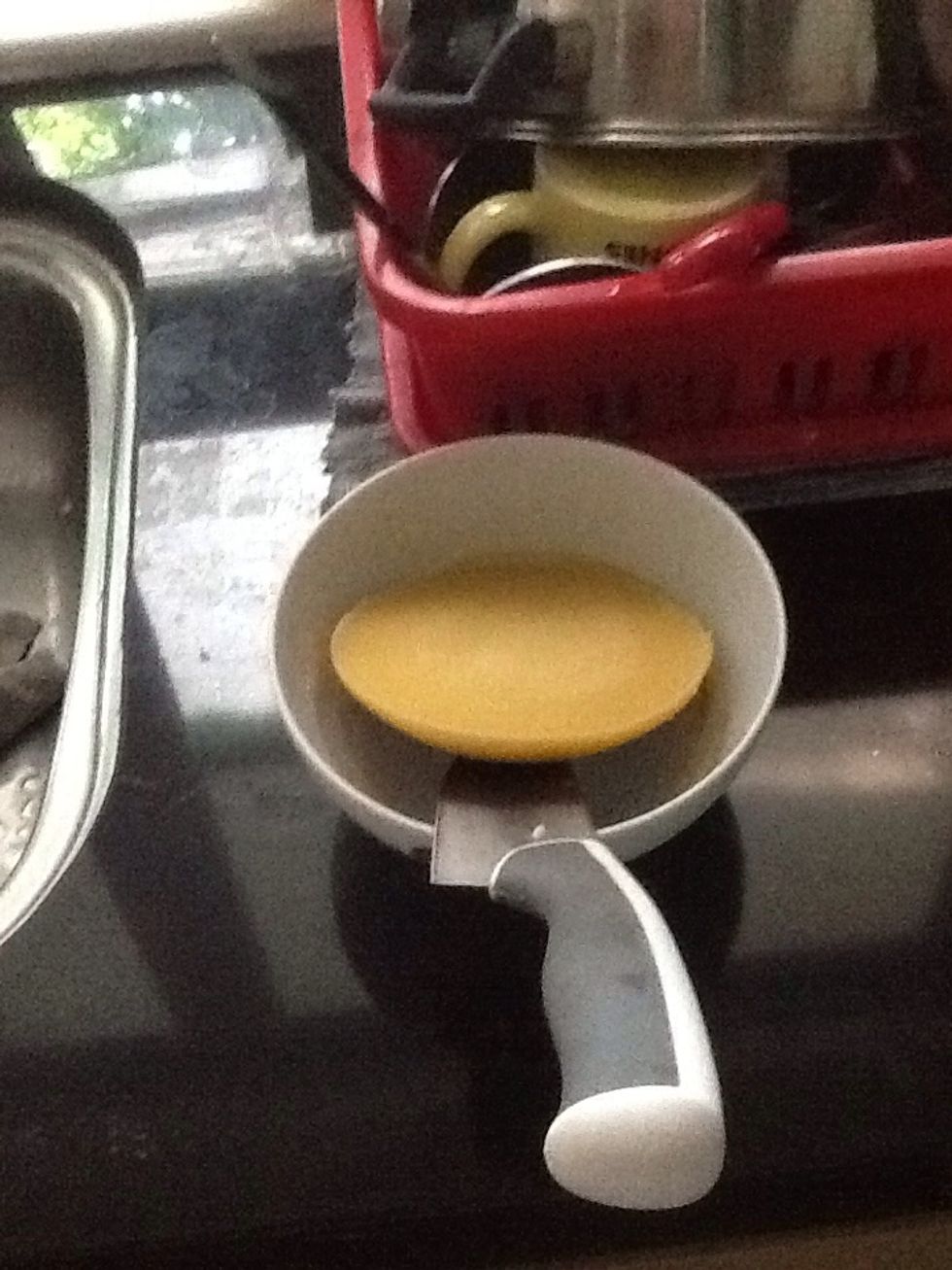 Run a knife around the bowl. Lift up the butter. Now go preheat the oven to 200 c or 395 f