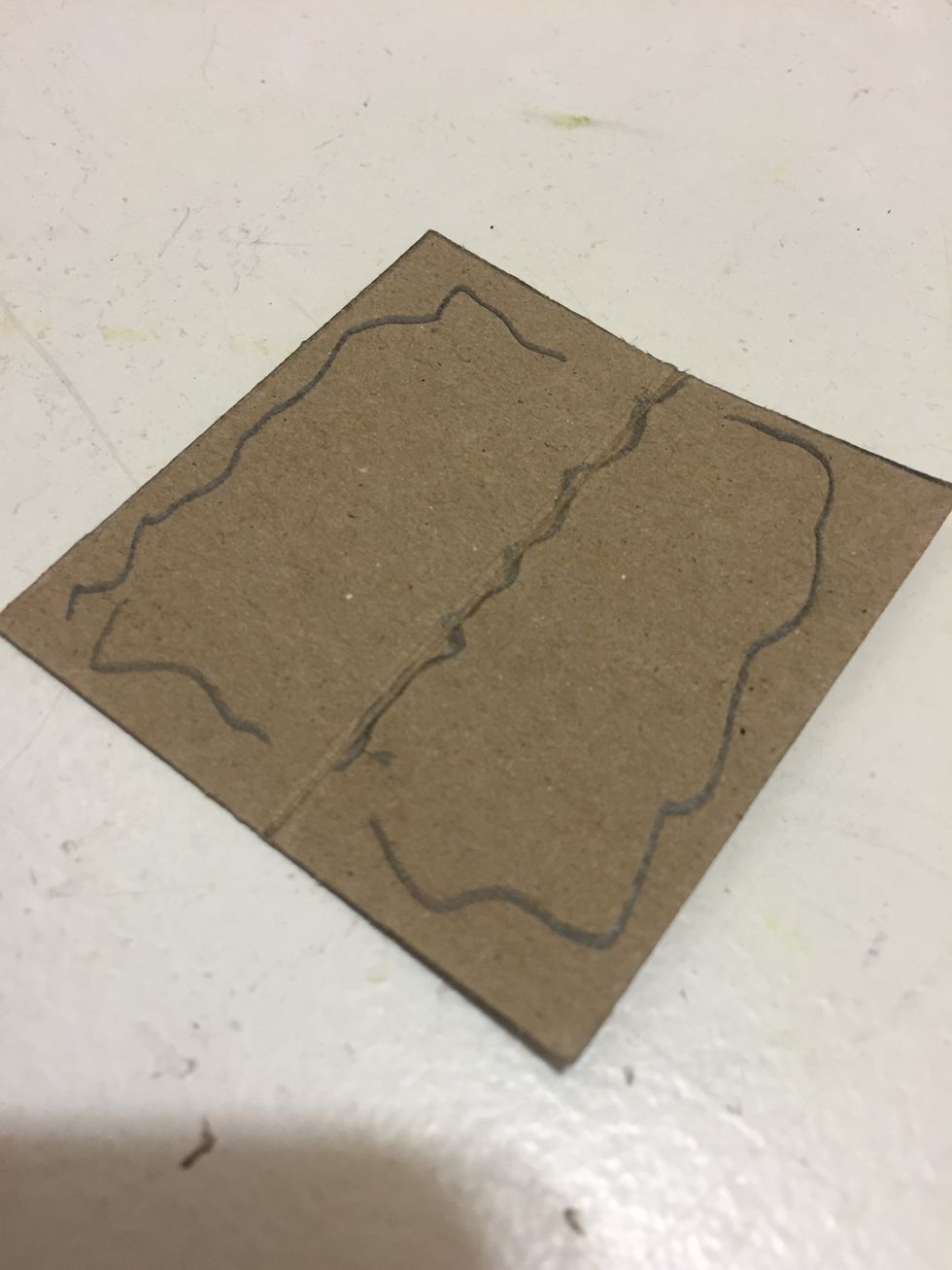 run hot glue as shown onto the back of the corners