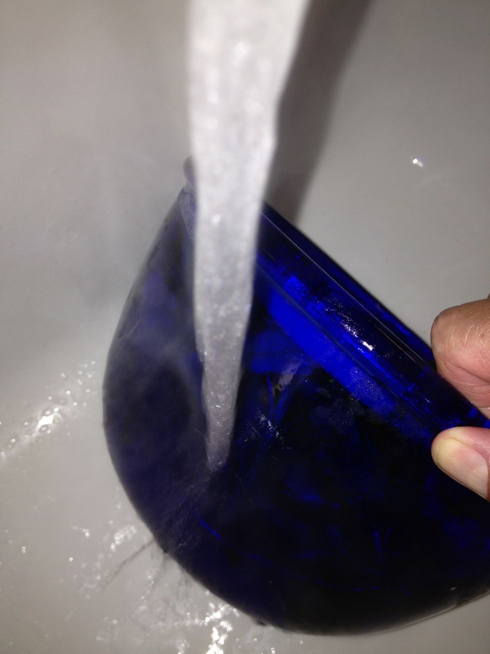 Run hot water over the outside of the bowl to loosen.