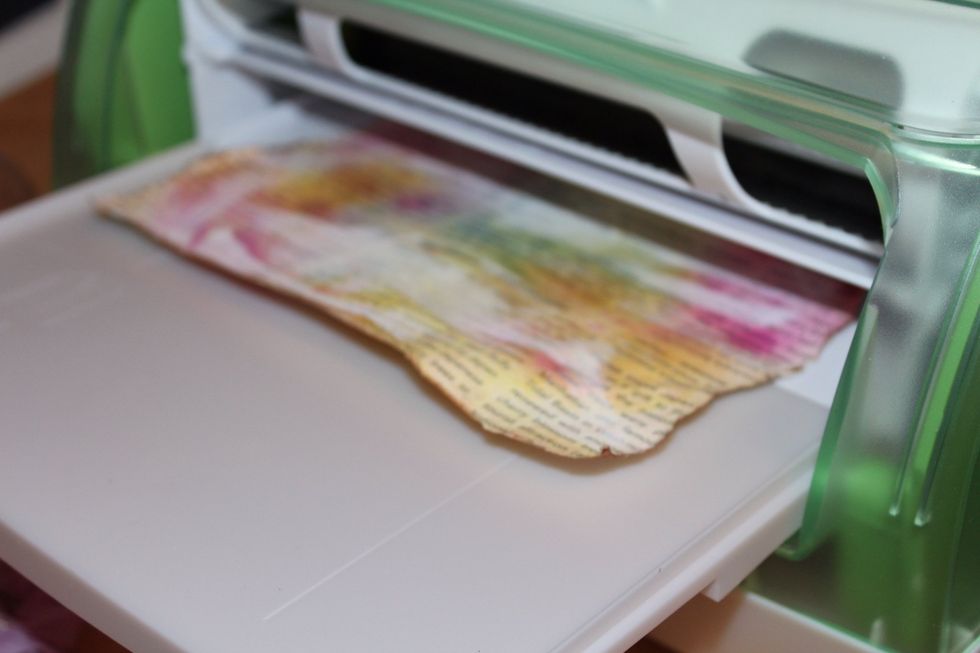 Run inked patterned paper layers and distressed photo through Xyron 9" Creative Station.