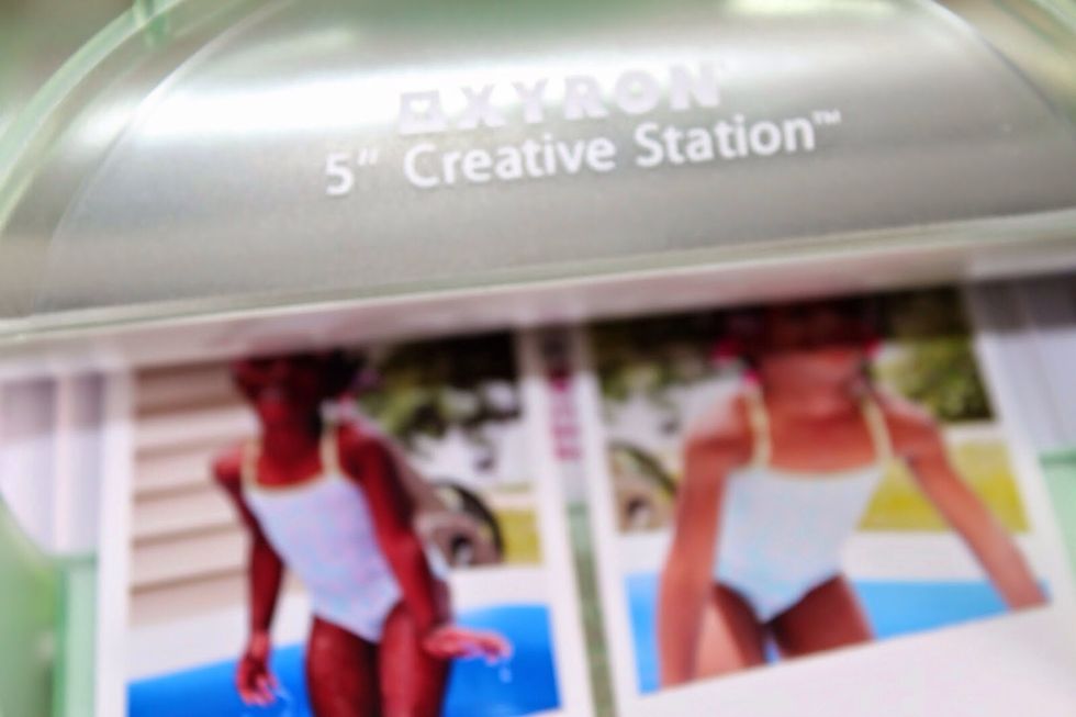 Run photos through the Xyron 5" Creative Station and add to canvas.