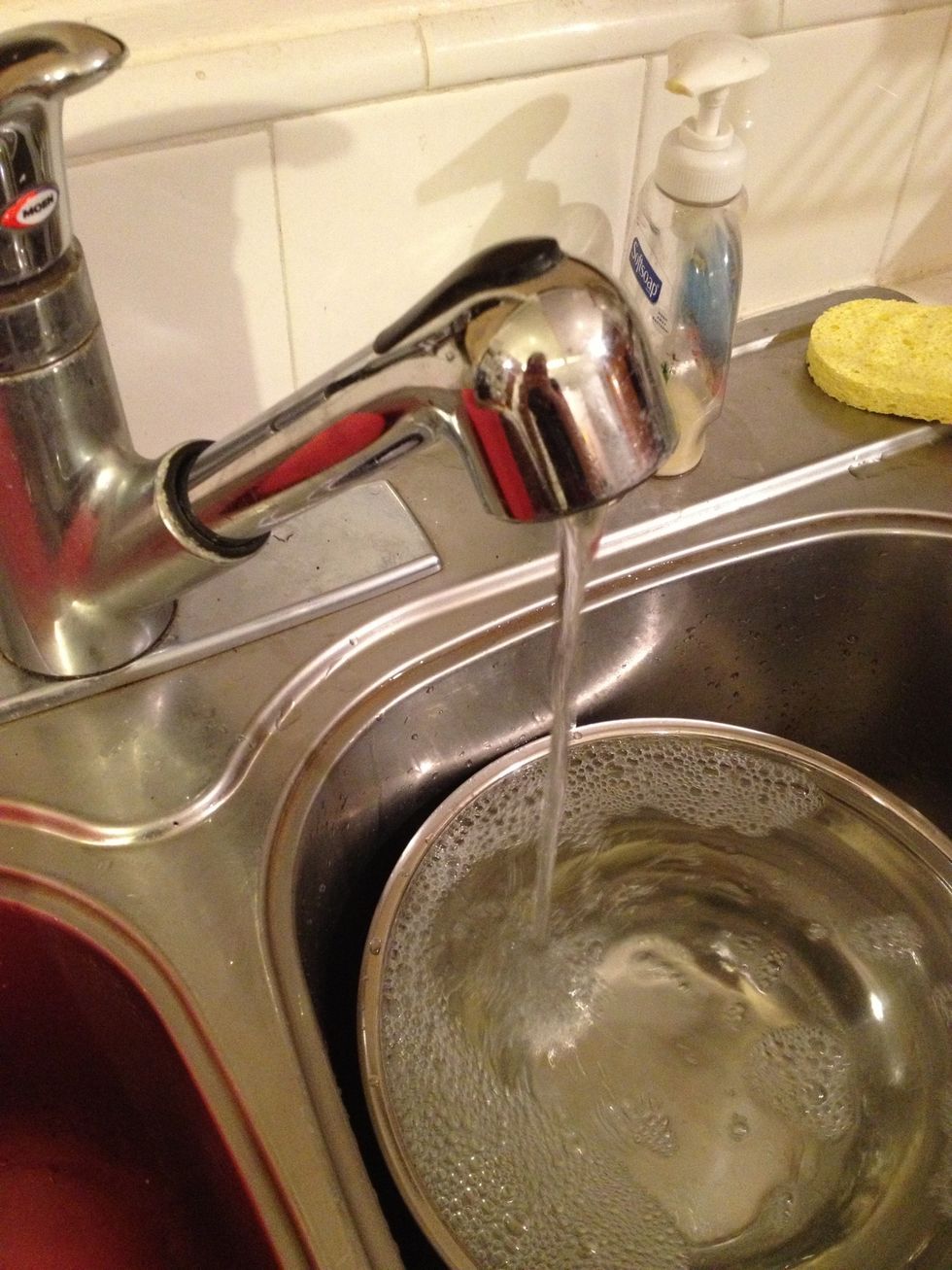 Run some very cold water. I used a bowl of water to break the fall a little