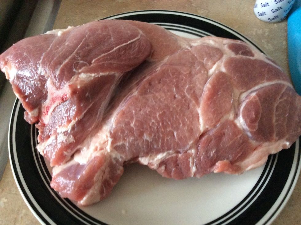 Run the pork under cold water to wash it off then pat dry. At this point rub your seasons on them. Both sides and the sides too. Don't leave a spot uncovered in that seasoning!