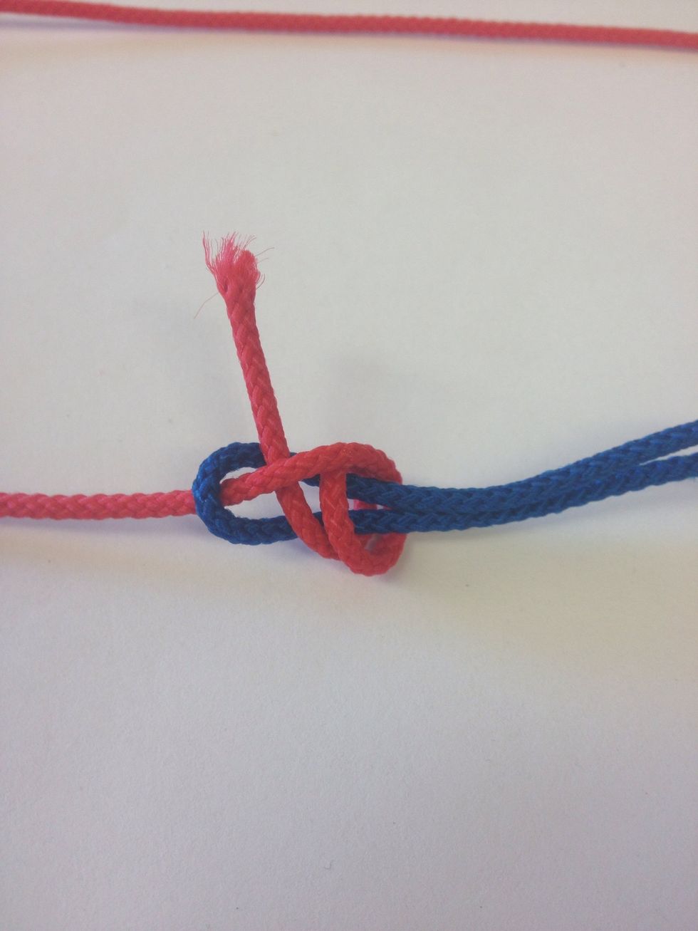 Run the red line under itself again (thus double sheetbend).