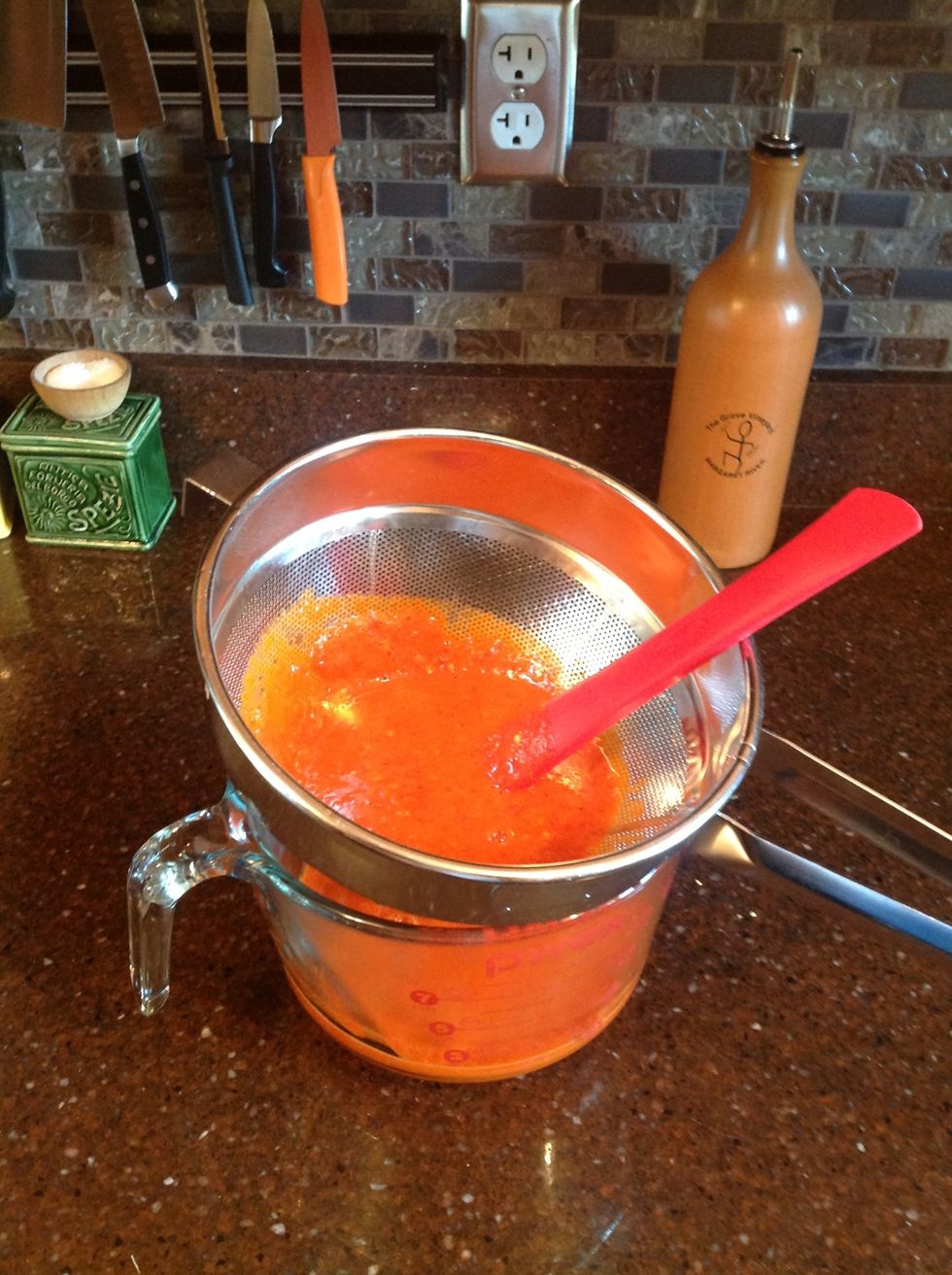 Run through a strainer and smush out as much juice as possible.