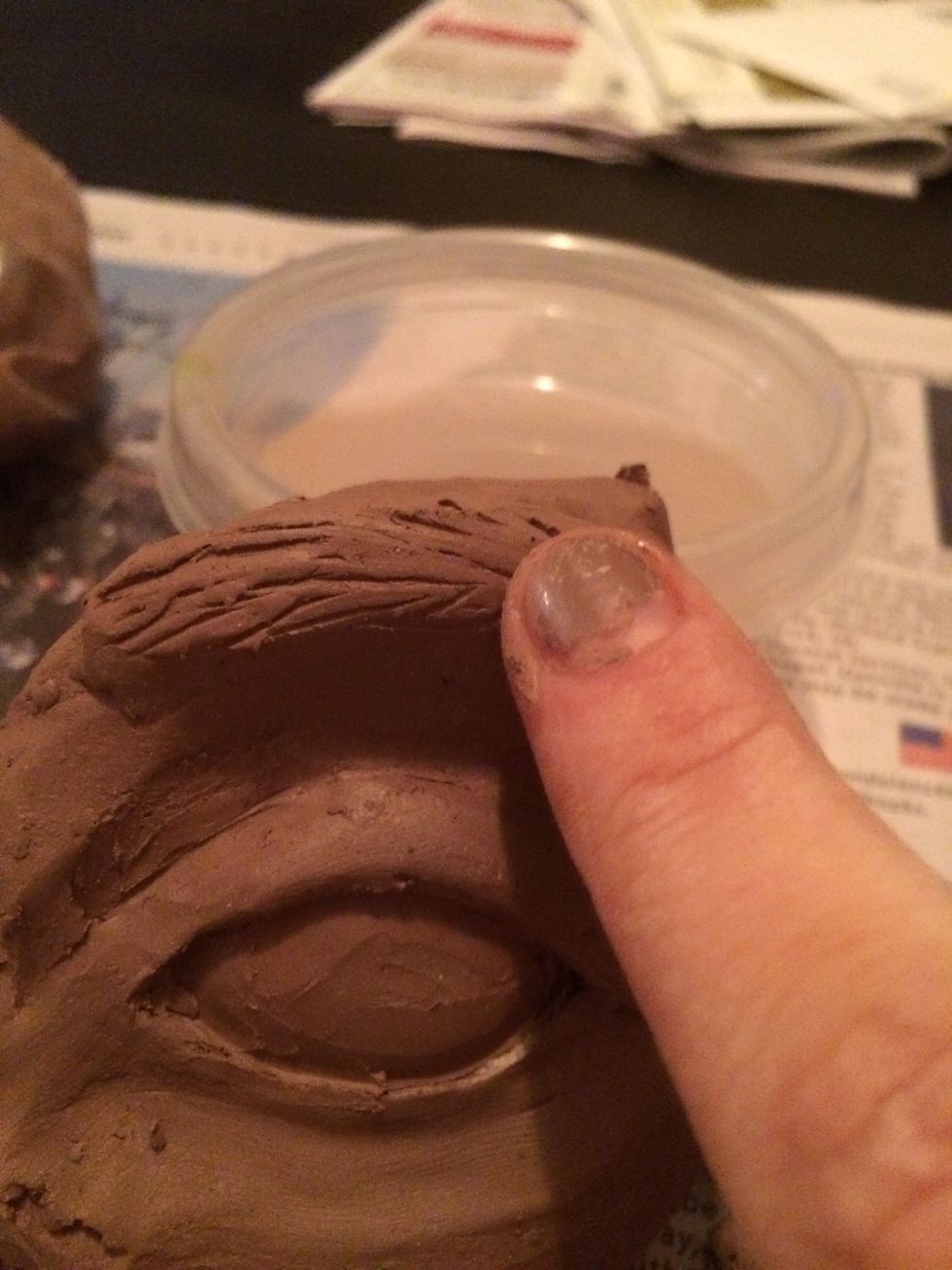 Run your finger over the texture to make the lines less obvious and softer.