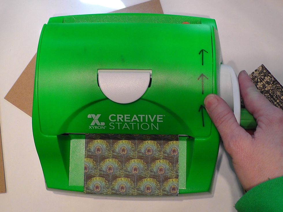 Run your paper through your Xyron 5 Inch Creative Station