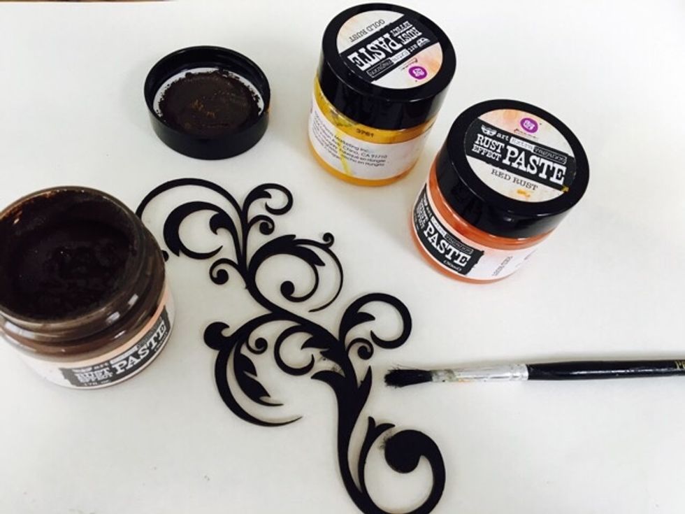 Rust Paste the perfect medium to start adding texture,apply this to your chipboard flourish piece. I usually start with the darkest, moving to red then yellow and then work my way back to dark again.
