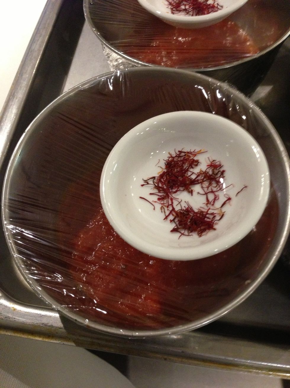 Saffron shreds and tomato sauce with tomato chunks